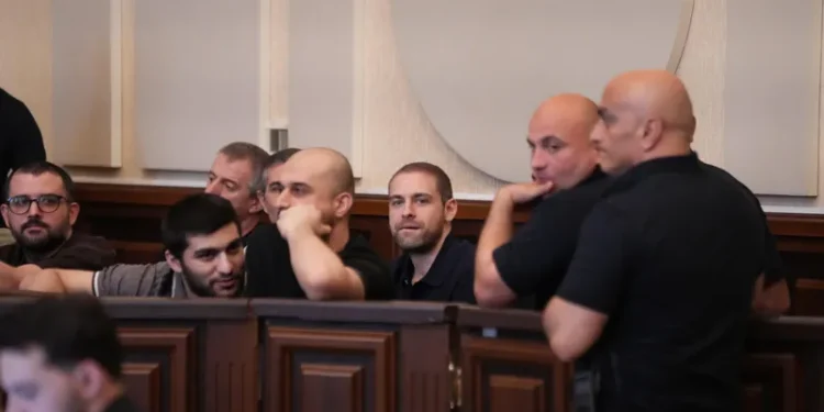 Court hears testimony in group violence case against protesters