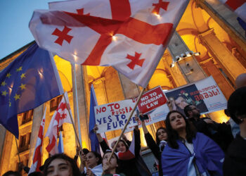 Protesters in front of Georgia's parliament building at a rally in Tbilisi in 2024. Photo by David Mdzinarishvili/EPA-EFE