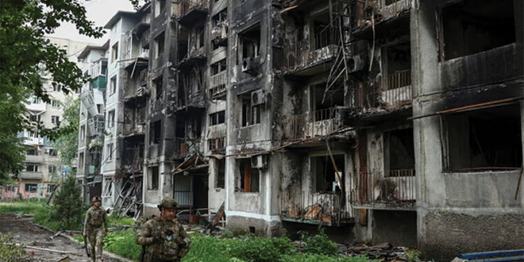 Ukrainian police in Pokrovsk. Photo by Anatolii Stepanov/Reuters
