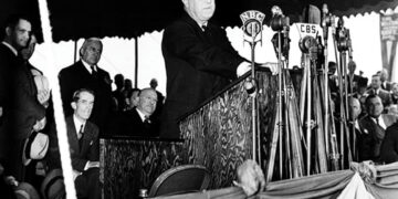 Franklin D. Roosevelt, 32nd president of the United States, making a dedicatory speech at the Centennial Bridge over the Chicago River, 5 October 1937. Source: Amazon