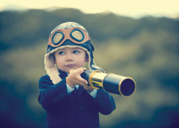 A child with a telescope. Source mind24-7