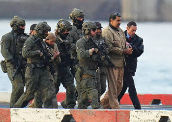Nicolas Maduro and his wife, Cilia Flores, in handcuffs after landing in Manhattan, New York, on January 5. Photo by XNY/Star Max/GC Images