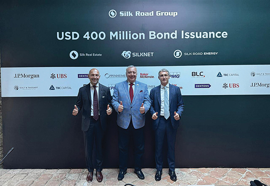 AmCham President Irakli Baidashvili (center) and AmCham Vice President and Treasurer George Tkhelidze (right) attend an event for Silk Road Group’s $400 million bond issuance.