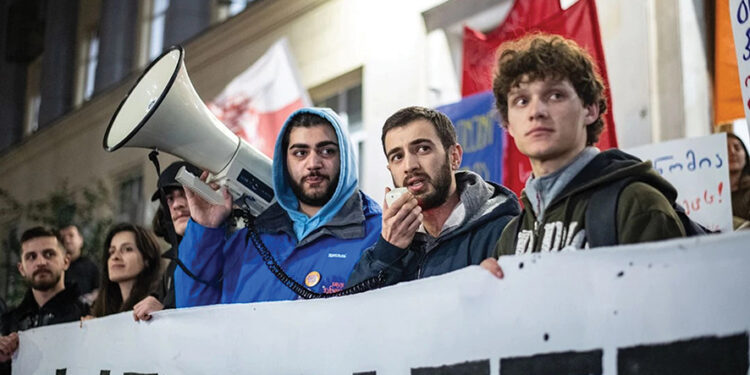 Students protesting at Ilia State University (ISU) following the Education Minister’s announcement. Photo: Mariam Nikuradze/OC Media