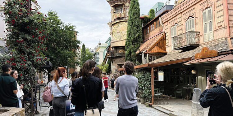 Tourists at the Gabriadze Theater Clock Tower. Source: visitgeorgia