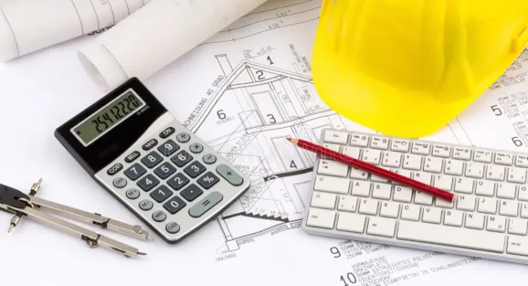 Architectural outline and a calculator. Photo: Dreamstime.