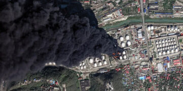 A satellite image shows smoke following drone attacks on a Russian oil facility in the Black Sea port of Tuapse, Russia, on April 16. Source: Vantor/Reuters