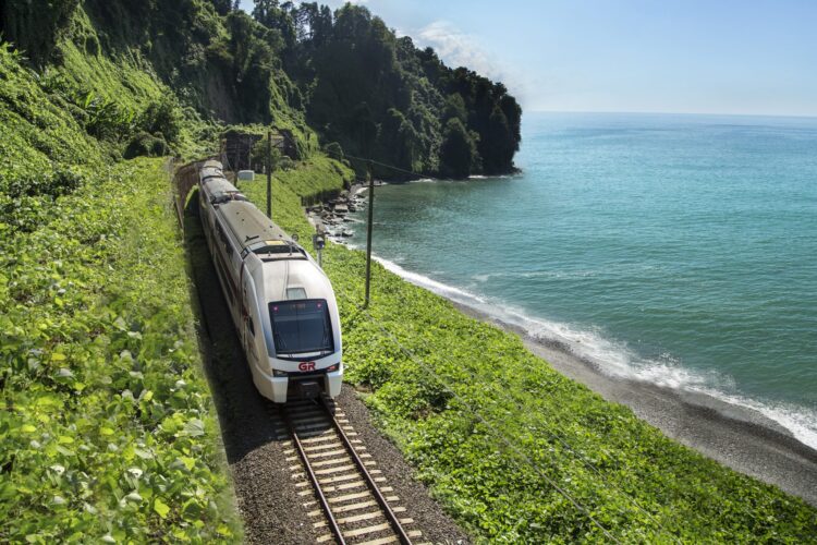 Georgian railway train next to the coastline. Photo: Georgian Railway.