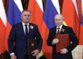 Alan Gagloev meets Vladimir Putin in Moscow. Source: cominf.org