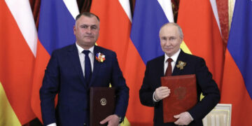 Alan Gagloev meets Vladimir Putin in Moscow. Source: cominf.org