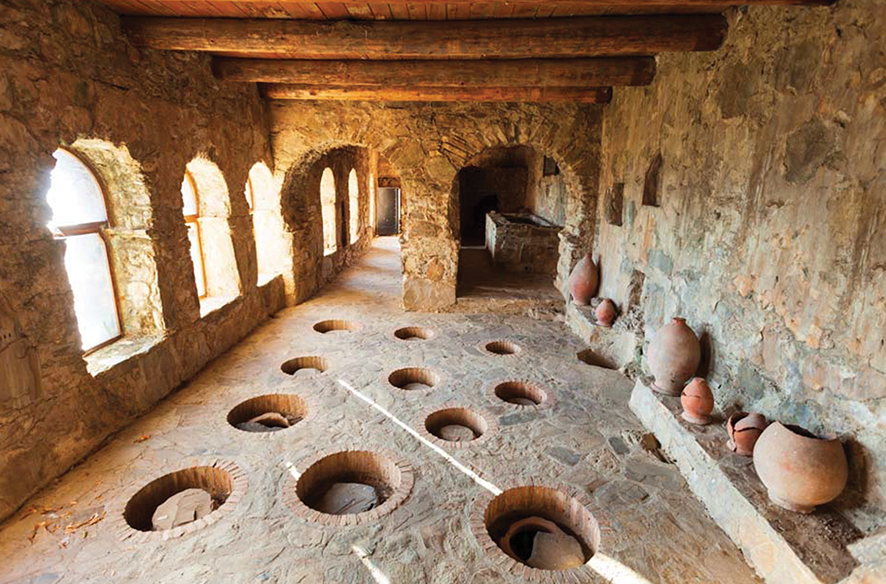 Qvevri buried in a wine cellar. Source: muchbetteradventures