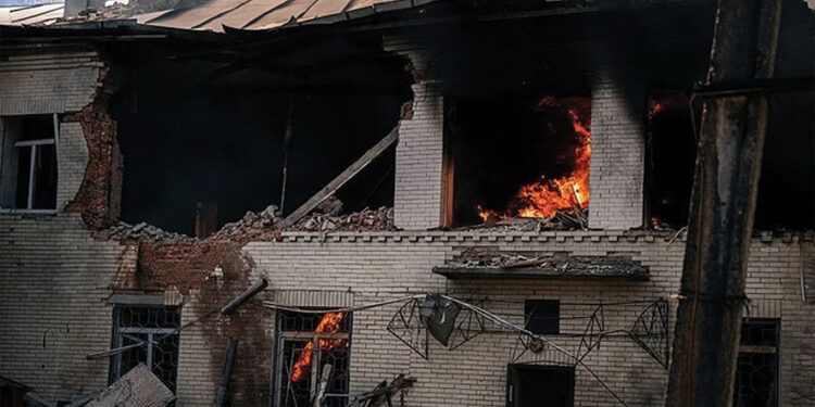 A kindergarten building burns after a Russian drone strike in Sumy, where a woman was killed and two other people were injured. Source: rte
