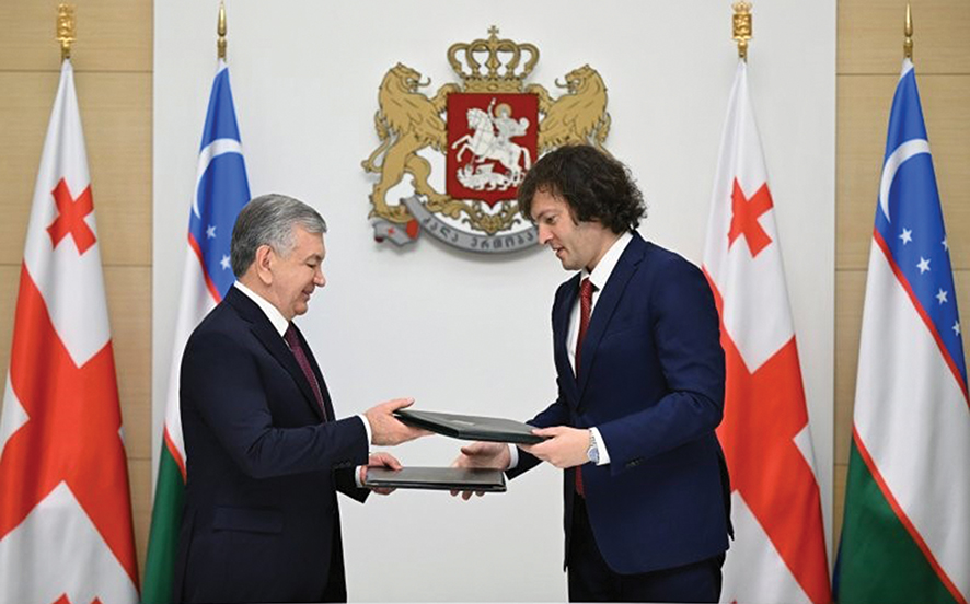 Uzbek President Shavkat Mirziyoyev and Georgian Prime Minister Irakli Kobakhidze establishing a strategic partnership in July. Source: news.az